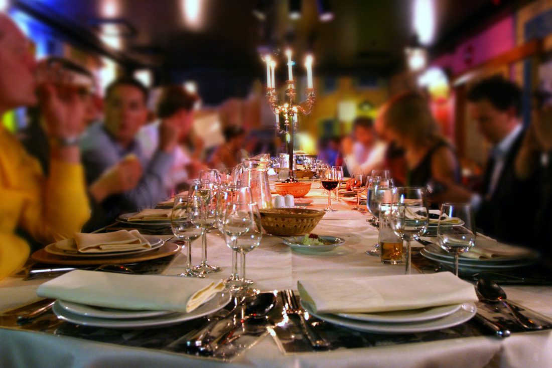 Guests at a long-table dinner