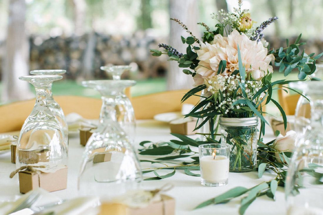 Wedding table with florals and glassware